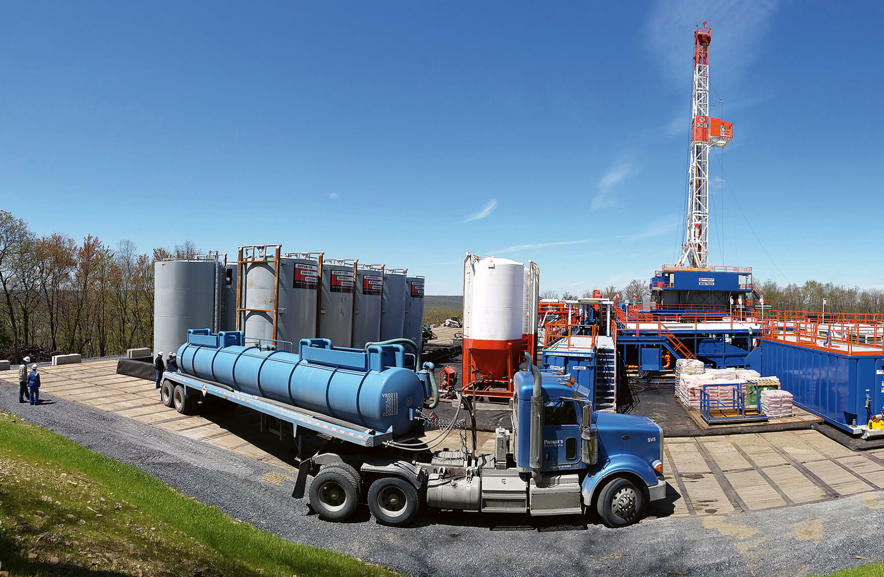 Fracking well pad with truck